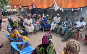 Villagers gather in a circle in Senegal, Africa