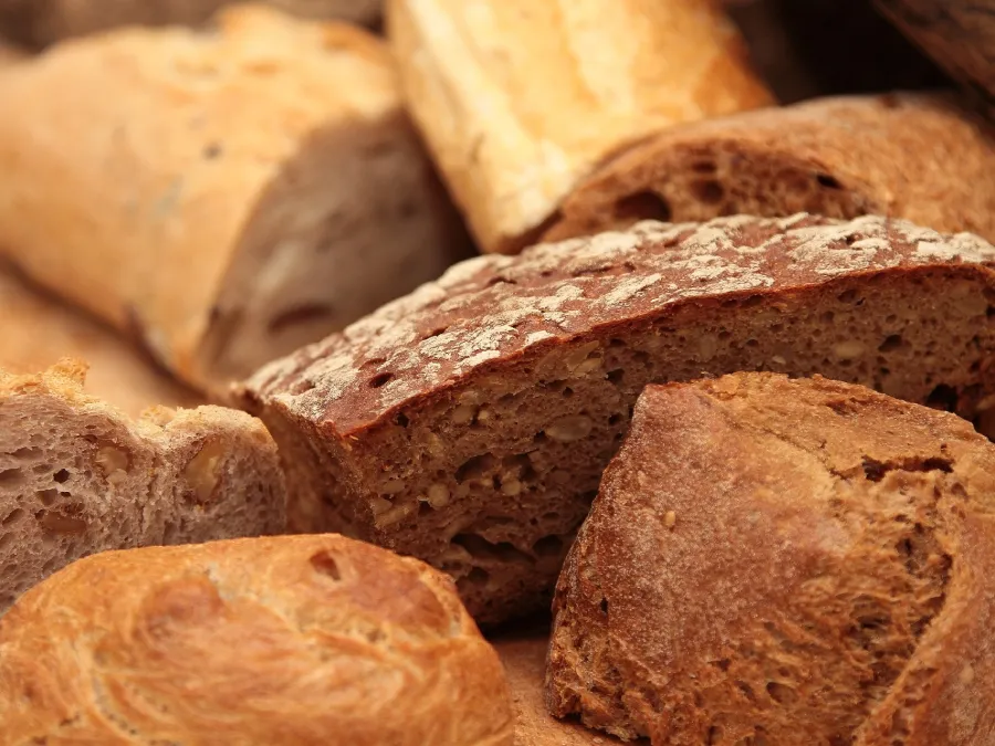 Assortment of whole grain breads on display.