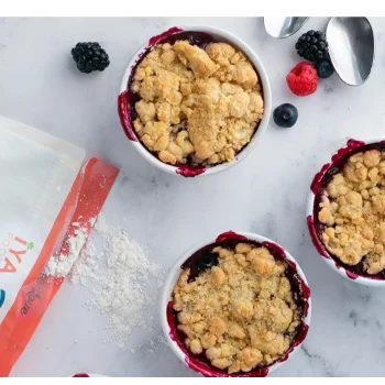 Three berry cobblers are displayed next to an open bag of gluten free flour